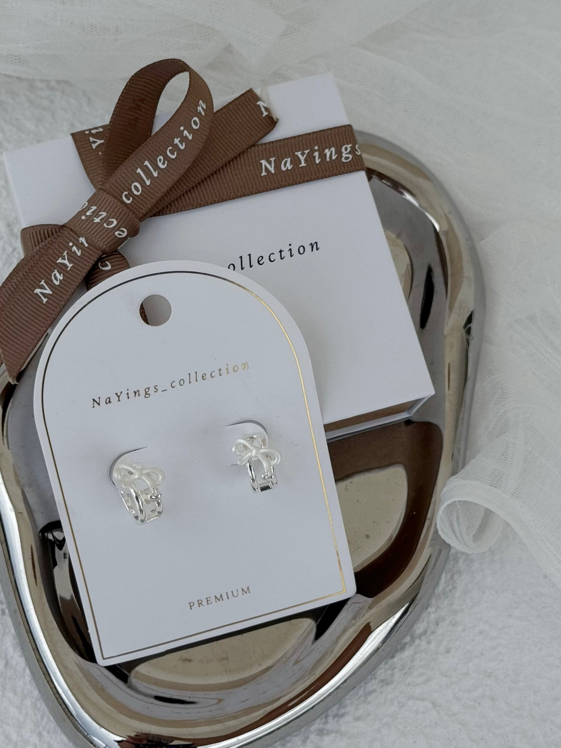 Tiny Ribbon Earrings in Silver