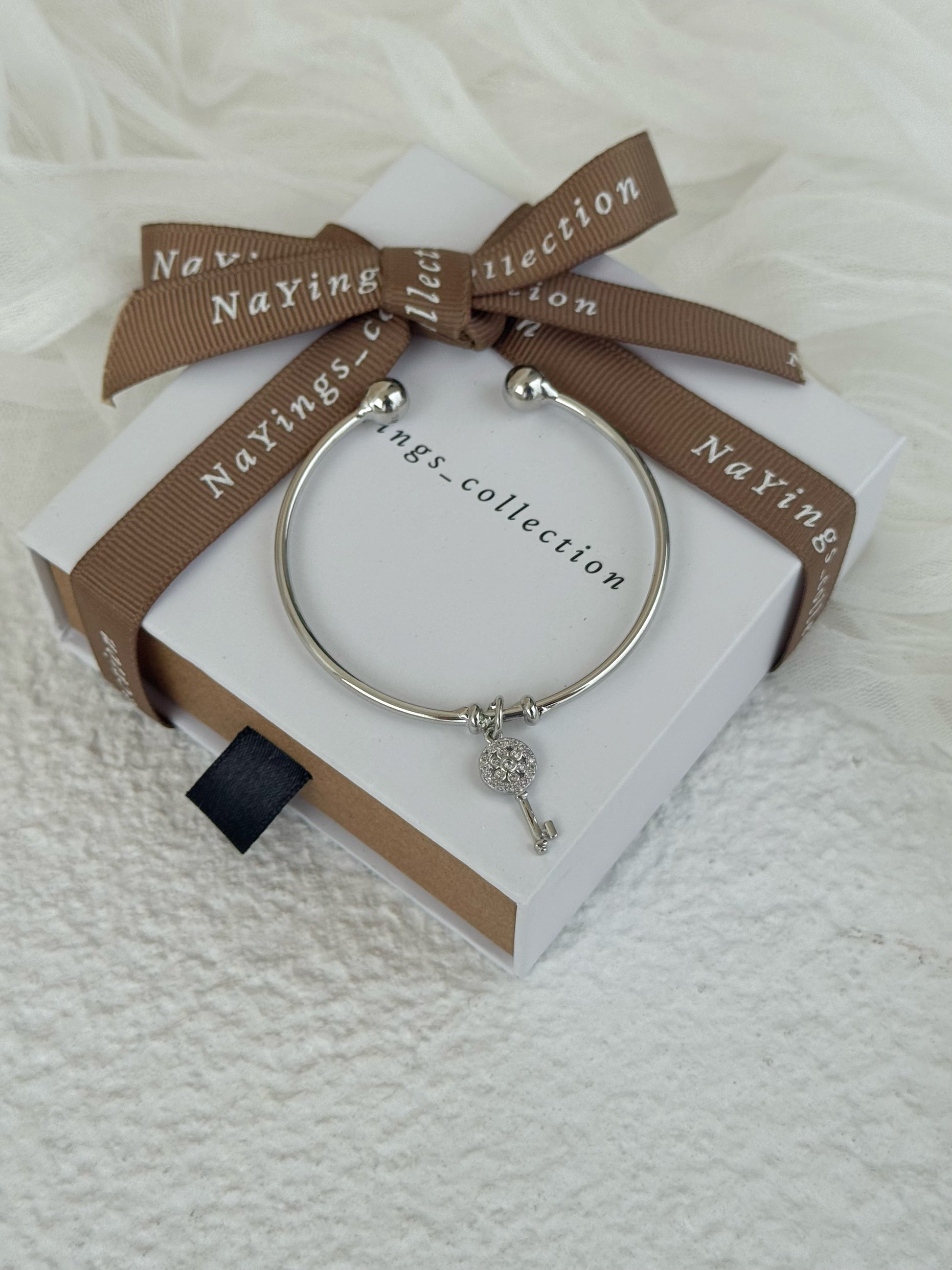 Key Adjustable Bangle in Silver
